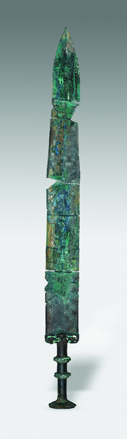 春秋暗菱形纹同心圆首剑